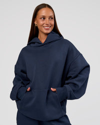Woman wearing MVP Oversized Hoodie - Future Navy | Model:Brylee | Size:XS