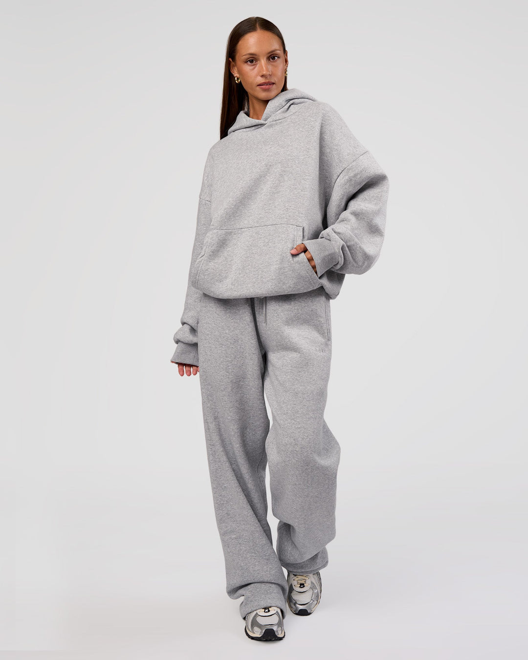 Woman wearing MVP Oversized Hoodie - Light Grey Marl | Model:Brylee | Size:XS