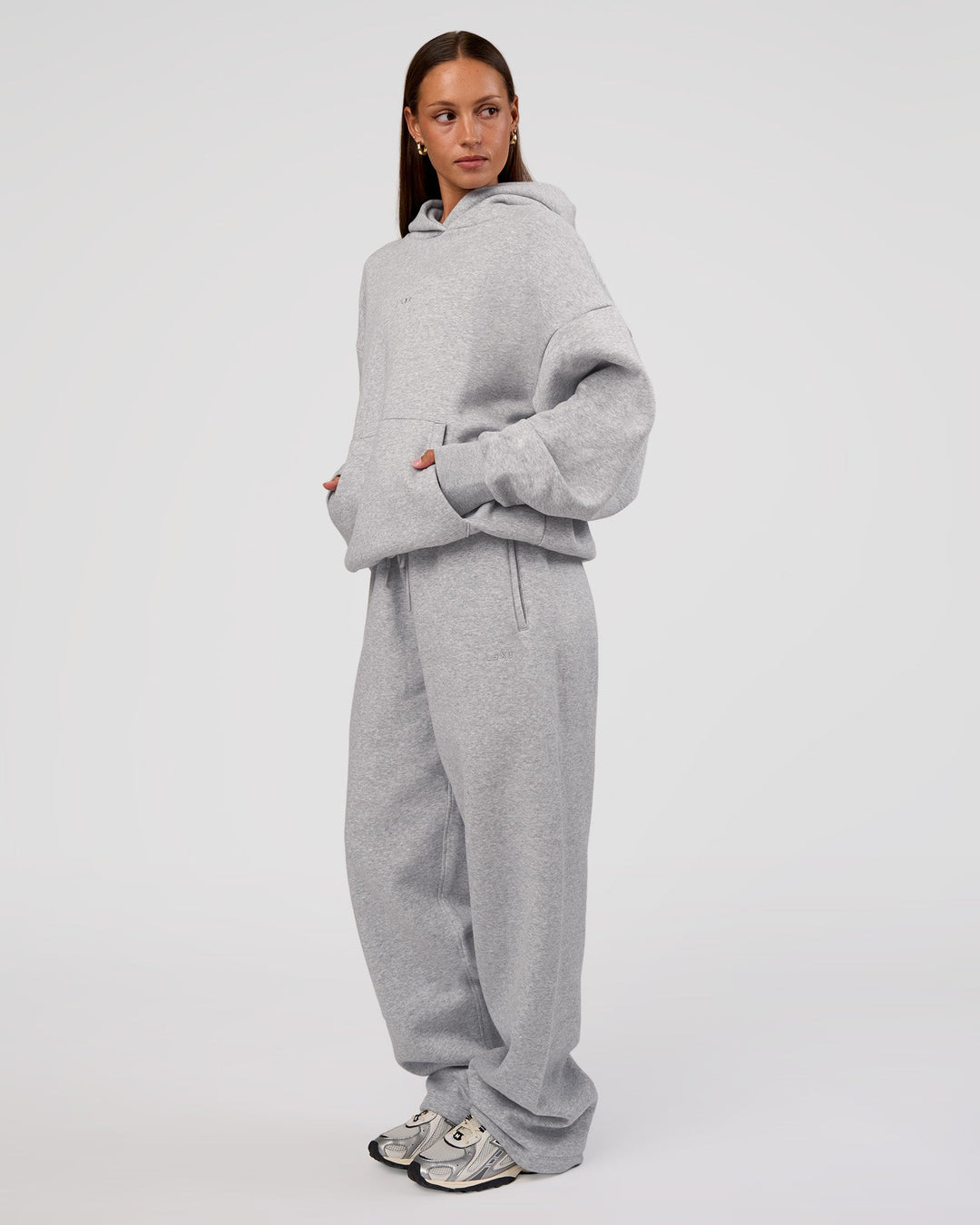 Woman wearing MVP Oversized Hoodie - Light Grey Marl | Model:Brylee | Size:XS