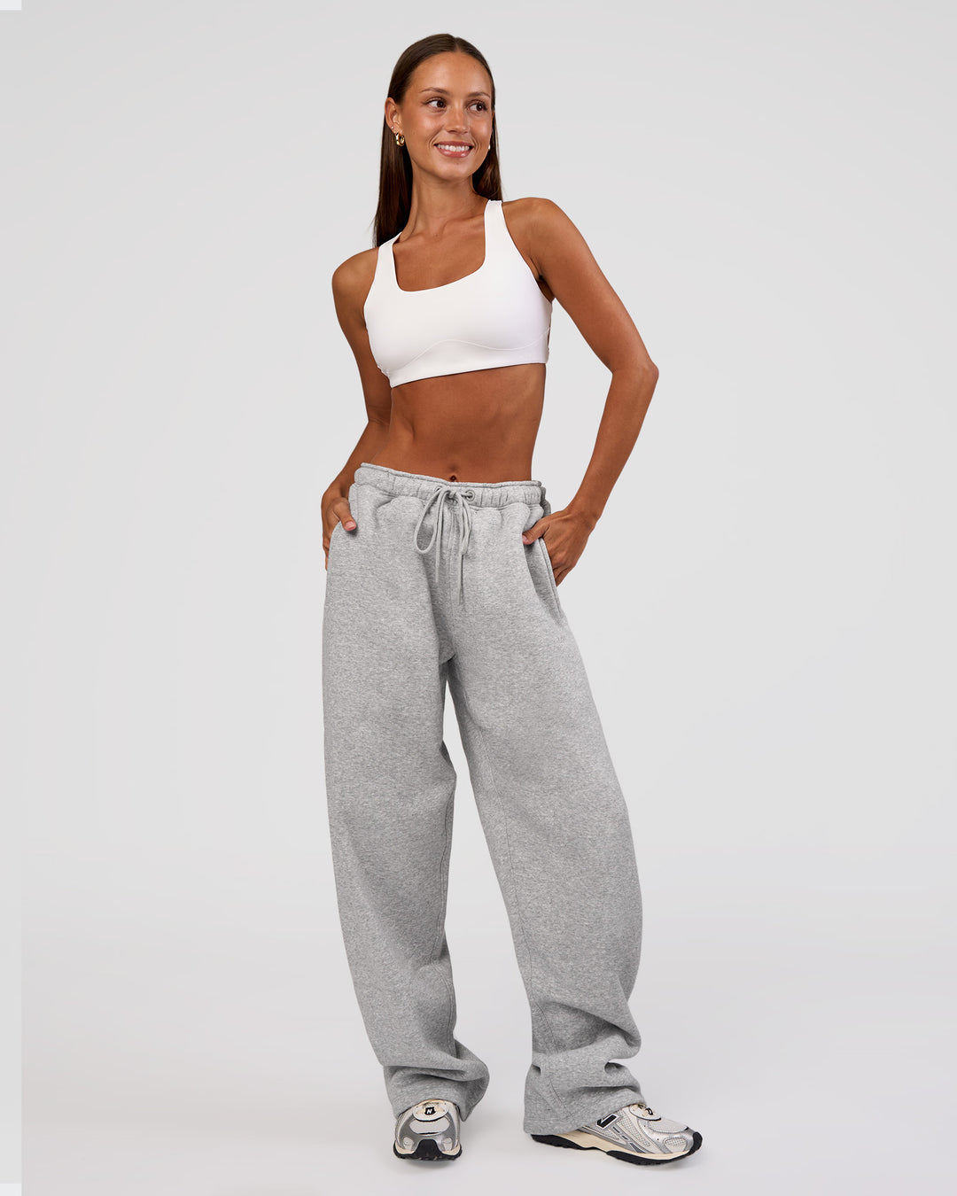 Woman wearing MVP Straight Leg Pant - Light Grey Marl | Model:Brylee | Size:XS