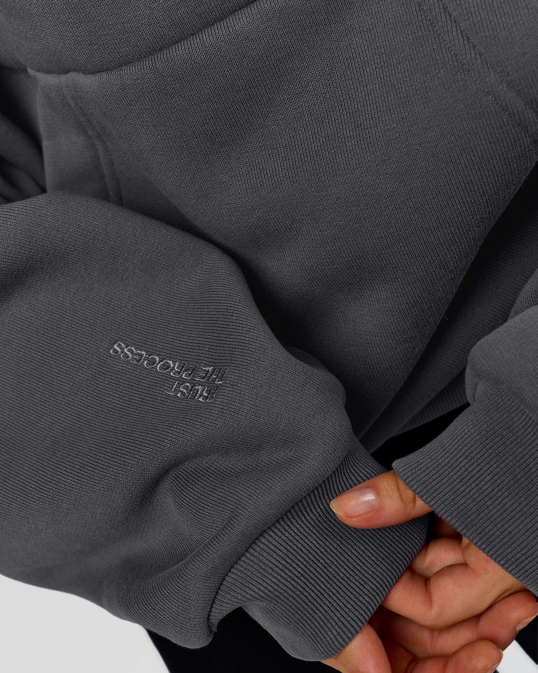Woman wearing Memory In Motion Ultra Heavyweight Washed Hoodie - Dark Storm Washed | Model:Leilani | Size:XS