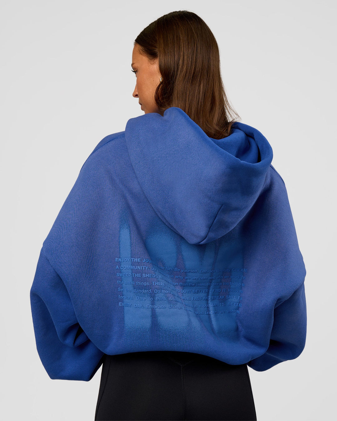 Woman wearing Memory In Motion Ultra Heavyweight Washed Hoodie - Electric Indigo Washed | Model:Brylee | Size:XS