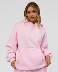 Woman wearing Memory In Motion Ultra Heavyweight Washed Hoodie - Marshmallow Washed | Model:Leilani | Size:XS