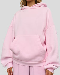 Woman wearing Memory In Motion Ultra Heavyweight Washed Hoodie - Marshmallow Washed | Model:Leilani | Size:XS