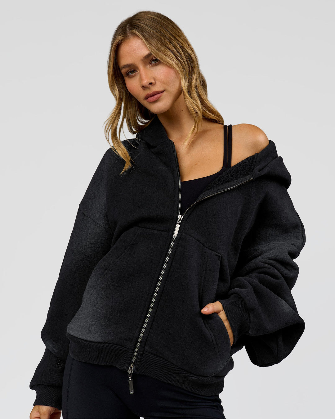 Woman wearing Memory in Motion Ultra Heavyweight Zip Thru Hoodie - Black Washed | Model:Leilani | Size:XS