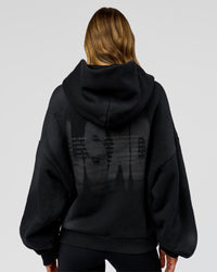 Woman wearing Memory in Motion Ultra Heavyweight Zip Thru Hoodie - Black Washed | Model:Leilani | Size:XS