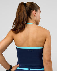 Woman wearing Milla Shelf Bra Tank - Future Navy-Baltic Sea | Model:Grace | Size:XS