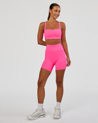 Woman wearing Momentum Corset Sports Bra - Sugar Plum | Model:Brylee | Size:XS