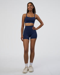 Woman wearing Momentum Sports Bra D/DD/E - Future Navy | Model:Jordan | Size:XS