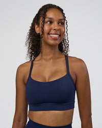 Woman wearing Momentum Sports Bra D/DD/E - Future Navy | Model:Jordan | Size:XS