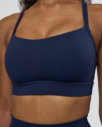 Woman wearing Momentum Sports Bra D/DD/E - Future Navy | Model:Jordan | Size:XS