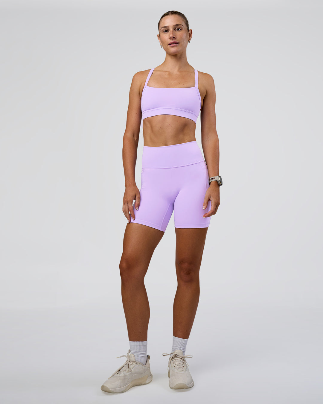 Woman wearing Momentum Sports Bra - Pale Lilac | Model:Emelia | Size:XS