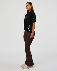 Woman wearing Mother's Day FLXCotton Oversize Tee - Black | Model:Brylee | Size:XS