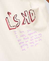 Woman wearing Mother's Day FLXCotton Oversize Tee - Off White | Model:Brylee | Size:XS