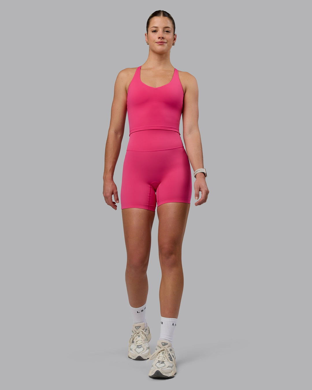 Woman wearing Movement Active Tank - Pink Flash