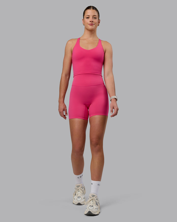 Woman wearing Movement Active Tank - Pink Flash
