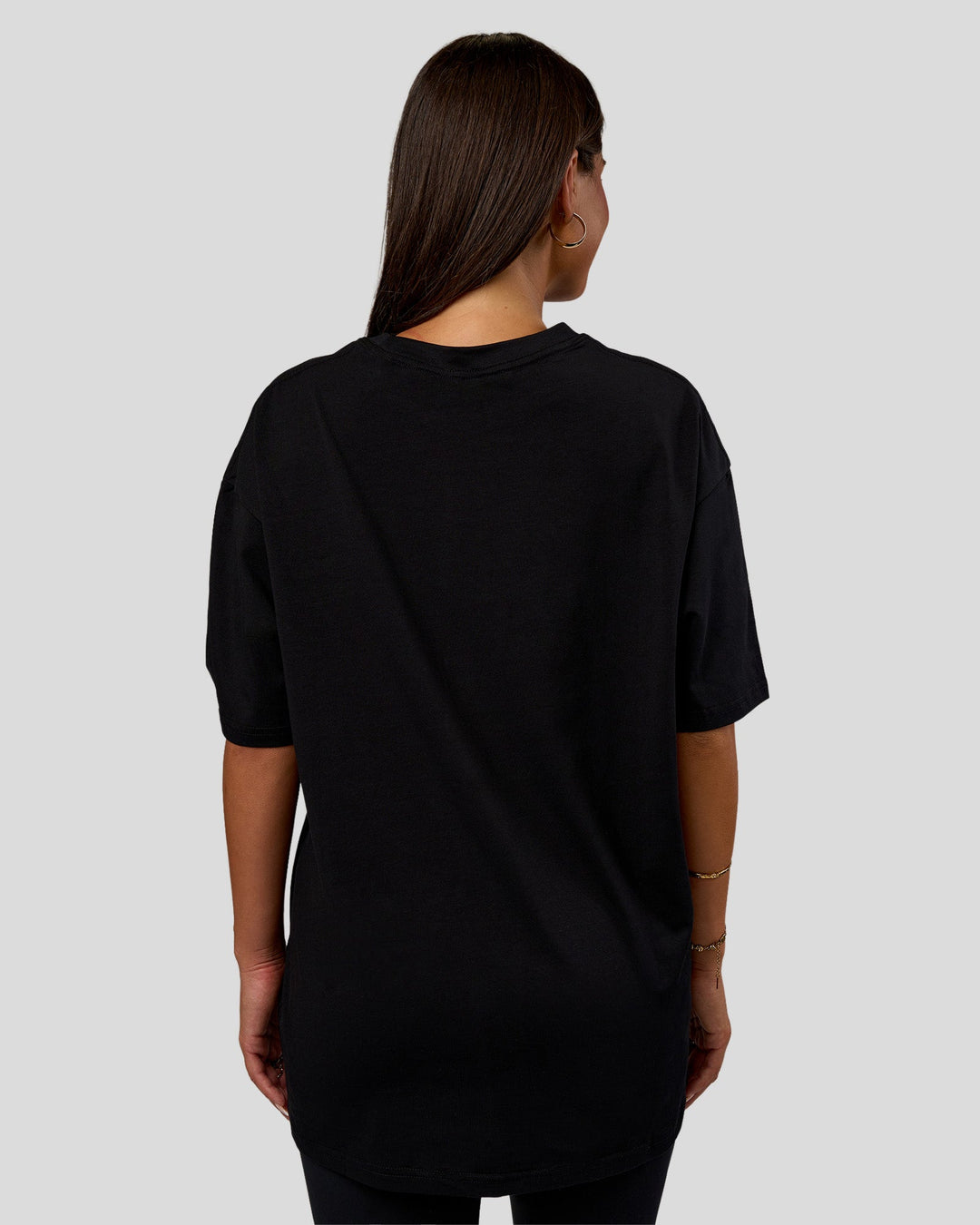 Woman wearing Nothing Is Impossible FLXCotton Oversized Tee - Black-Flame | Model:Bianca | Size:XS