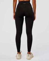 Woman wearing O.G Fusion Ultra High-Rise Full Length Legging Pockets - Black | Model:Charli | Size:XS