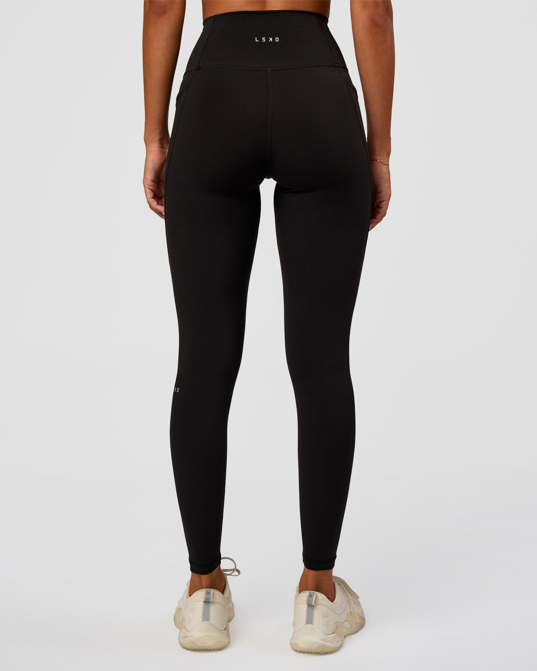 Woman wearing O.G Fusion Ultra High-Rise Full Length Legging Pockets - Black | Model:Charli | Size:XS - view 8