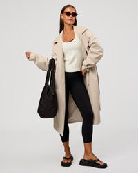 Woman wearing On the Move Trench Coat - Shale Beige | Model:Brylee | Size:XS