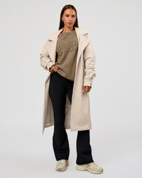 Woman wearing On the Move Trench Coat - Shale Beige | Model:Brylee | Size:XS