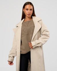 Woman wearing On the Move Trench Coat - Shale Beige | Model:Brylee | Size:XS
