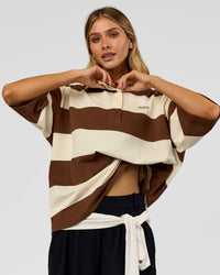 Woman wearing Oversized Rugby Polo - Off White - Brown | Model:Leilani | Size:XS