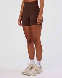 Woman wearing Peaches Elixir High-Rise 6” Short - Hot Chocolate | Model:Brylee | Size:XS
