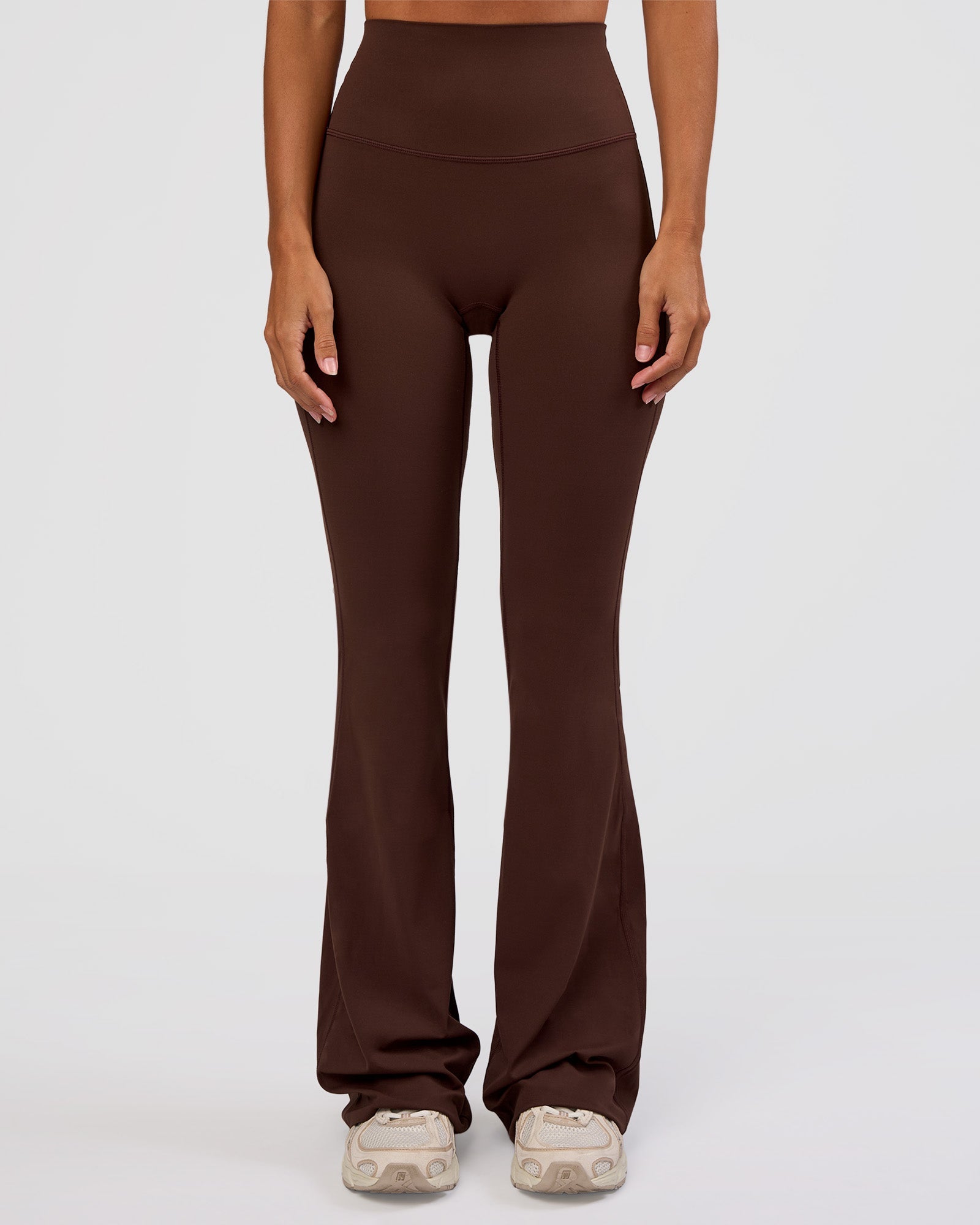 Woman wearing Peaches Elixir High-Rise Flared Pant - Hot Chocolate | Model:Brylee | Size:XS