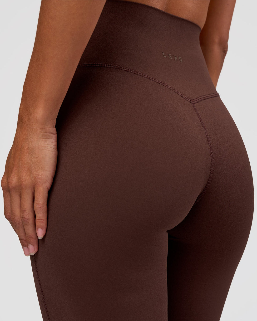 Woman wearing Peaches Elixir High-Rise Flared Pant - Hot Chocolate | Model:Brylee | Size:XS