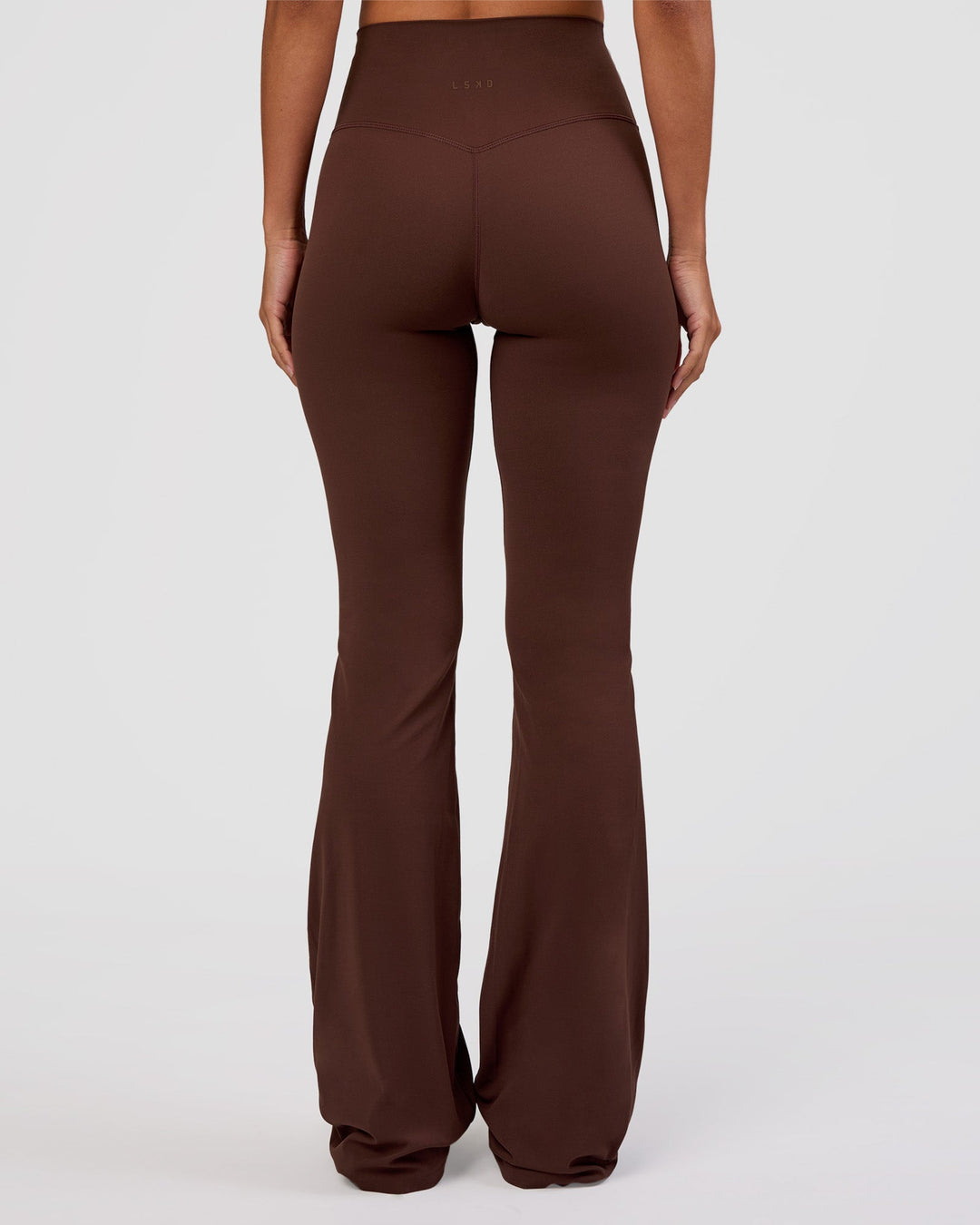 Woman wearing Peaches Elixir High-Rise Flared Pant - Hot Chocolate | Model:Brylee | Size:XS