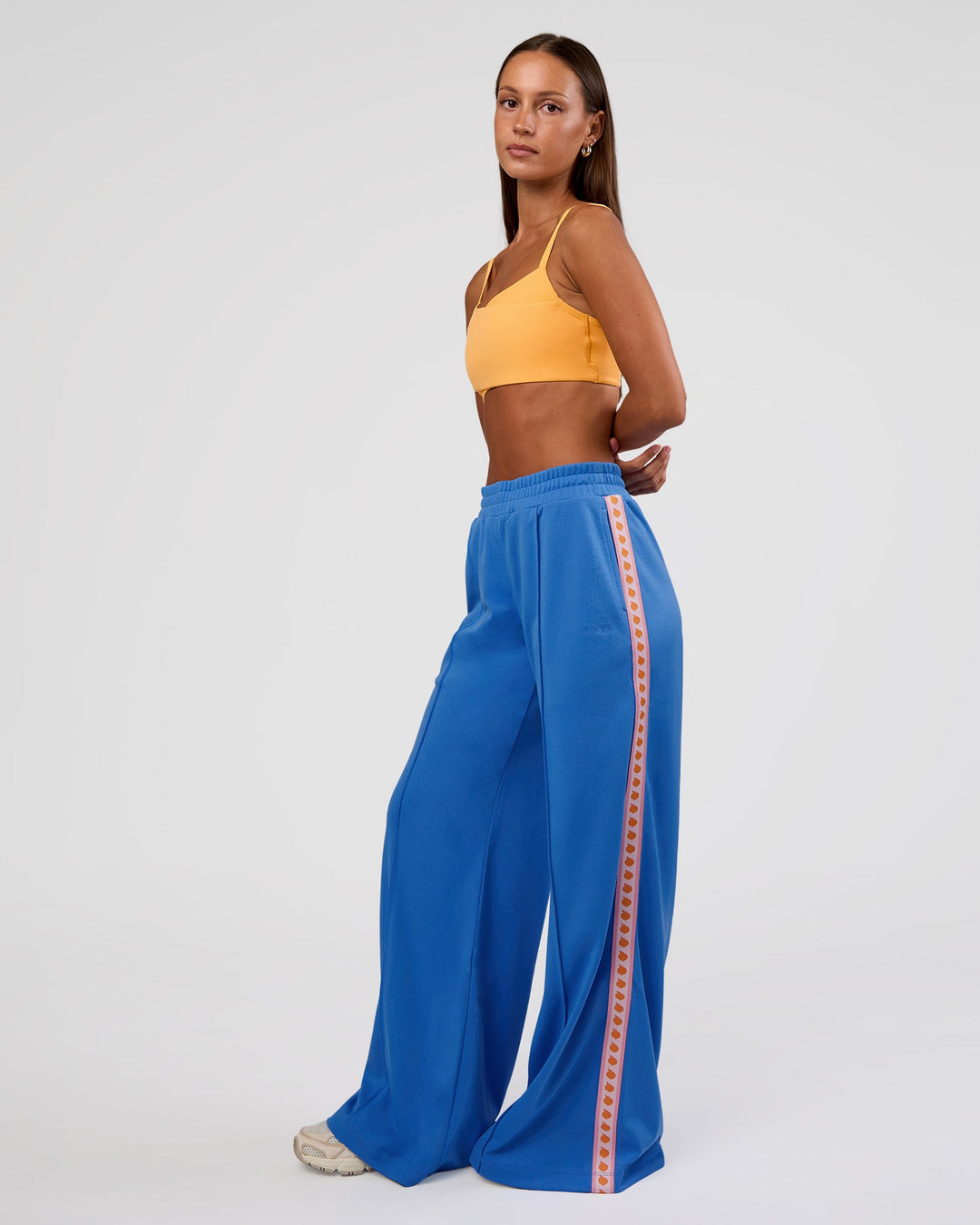 Woman wearing Peaches Track Pant - Palace Blue | Model:Brylee | Size:XS - view 6
