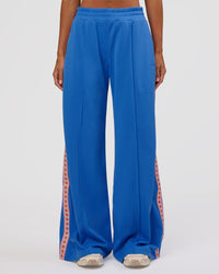 Woman wearing Peaches Track Pant - Palace Blue | Model:Brylee | Size:XS | Thumbnail Index: 9