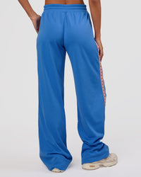 Woman wearing Peaches Track Pant - Palace Blue | Model:Brylee | Size:XS | Thumbnail Index: 4