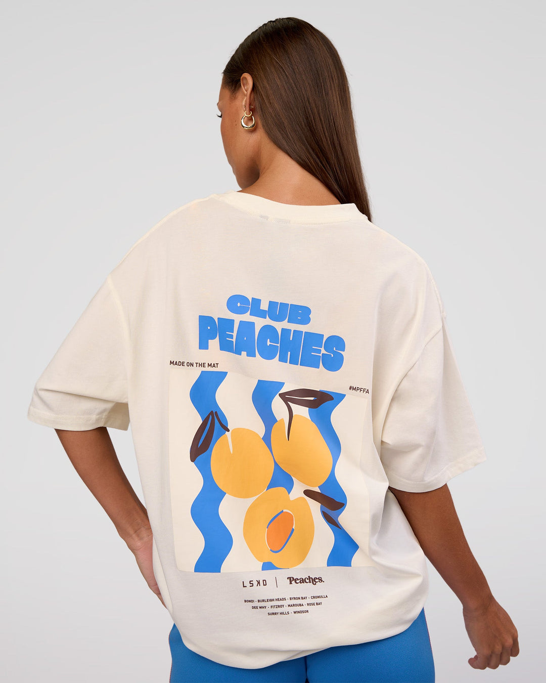 Woman wearing Peaches x LSKD Collection FLXCotton Oversize Tee - Off White | Model:Brylee | Size:XS