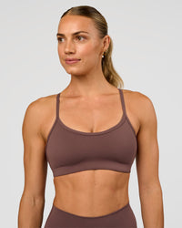 Woman wearing Pinnacle Sports Bra - Cocoa Powder | Model:Maja | Size:XS