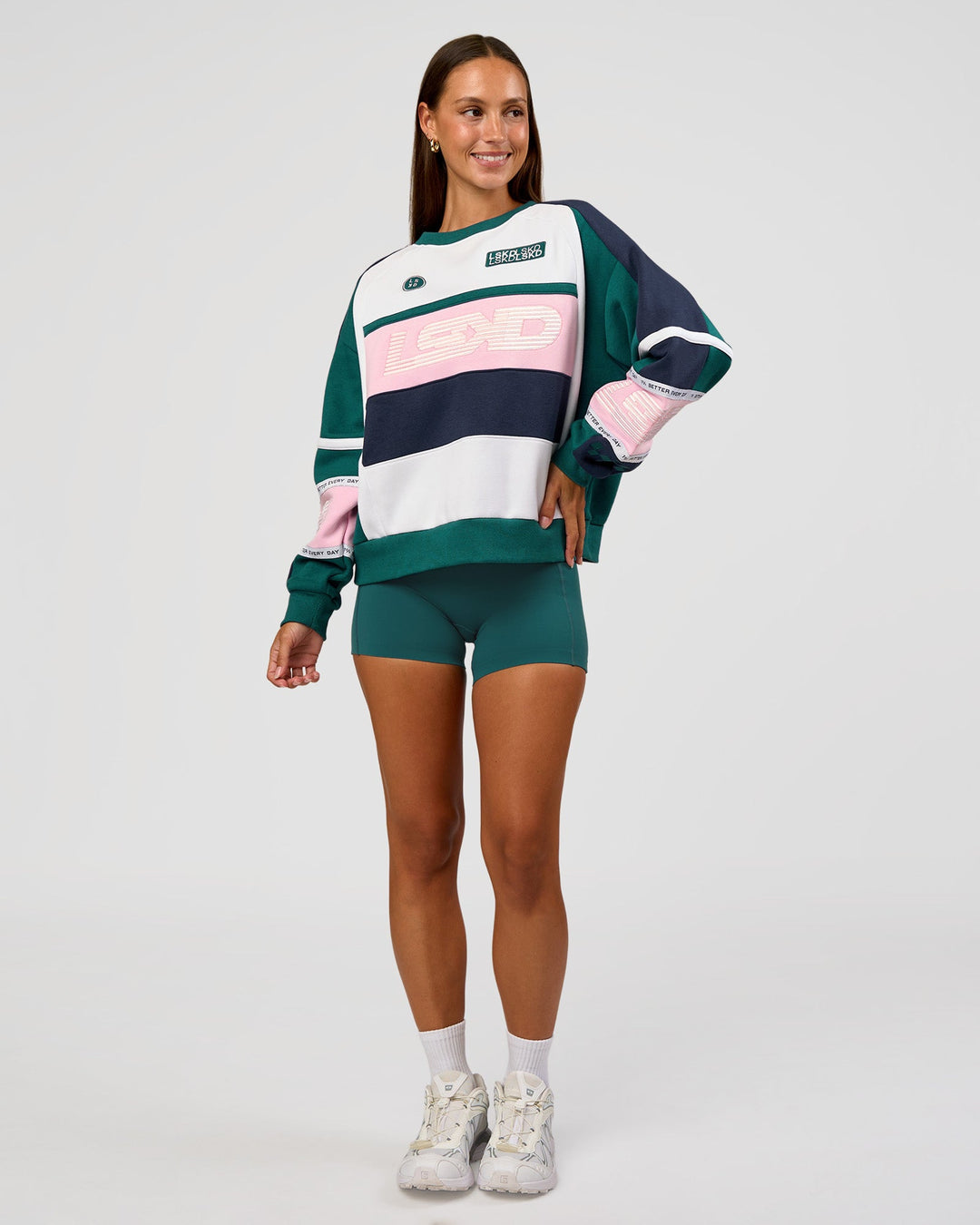 Woman wearing Power Sweater - Future Navy-Teal | Model:Brylee | Size:XS