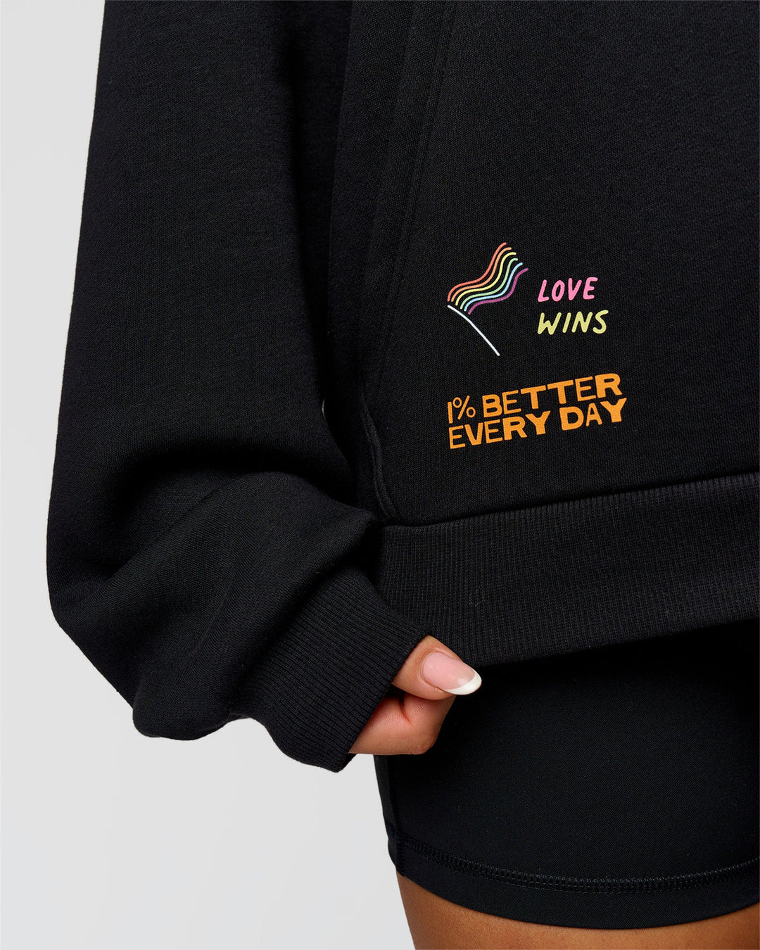 Woman wearing Pride Sticker Boxy Hoodie - Black | Model:Bianca | Size:XS