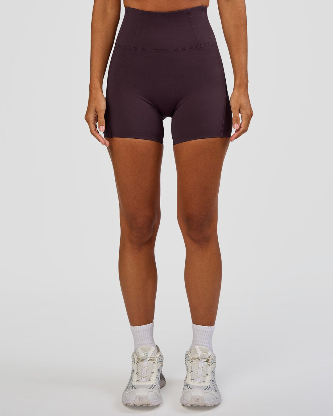 Woman wearing Progression Ultra High-Rise 4" Short - Midnight Plum | Model:Brylee | Size:XS