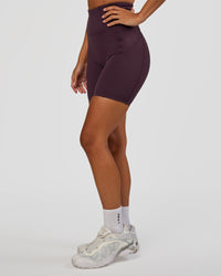 Woman wearing Progression Ultra High-Rise 6" Short - Midnight Plum | Mode:Brylee | Size:XS