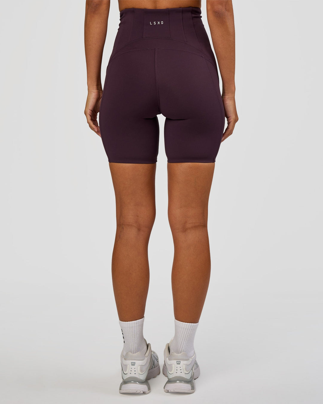 Woman wearing Progression Ultra High-Rise 6" Short - Midnight Plum | Mode:Brylee | Size:XS