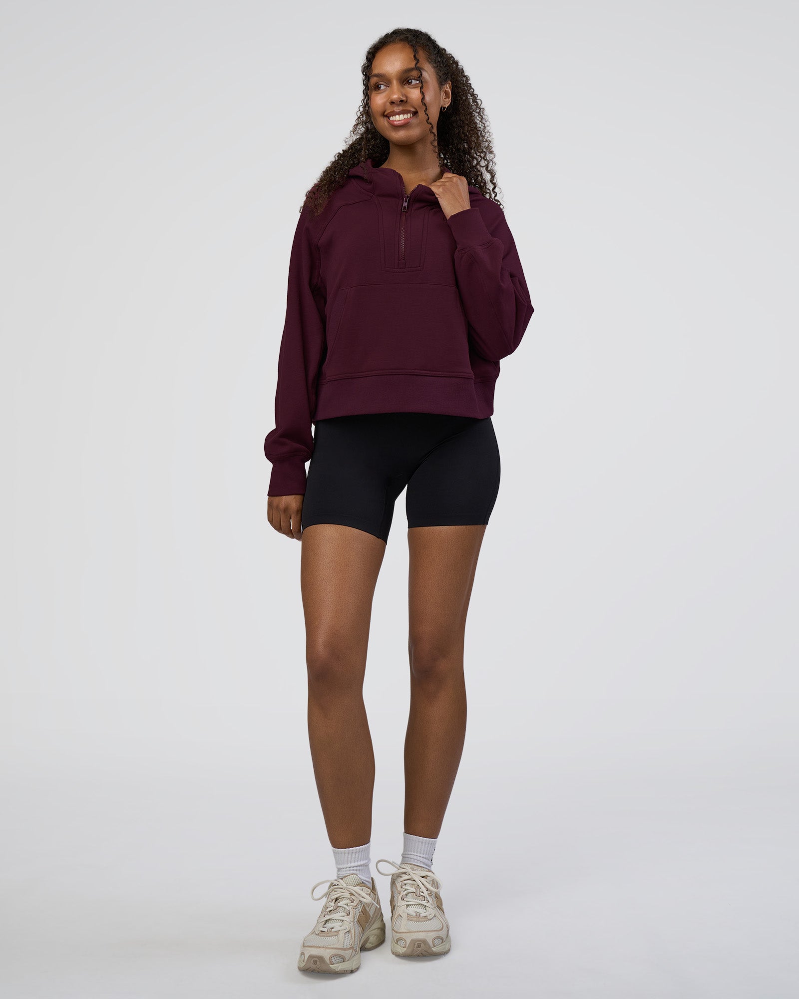 Woman wearing Pursue Mid-Weight Hoodie - Cherry Lacquer | Model:Jordan | Size:XS