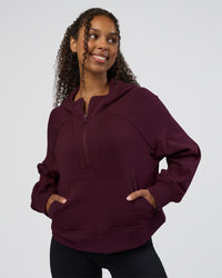 Woman wearing Pursue Mid-Weight Hoodie - Cherry Lacquer | Model:Jordan | Size:XS