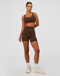 Woman wearing Race Day Sports Bra - Hot Chocolate | Model:Brylee | Size:XS
