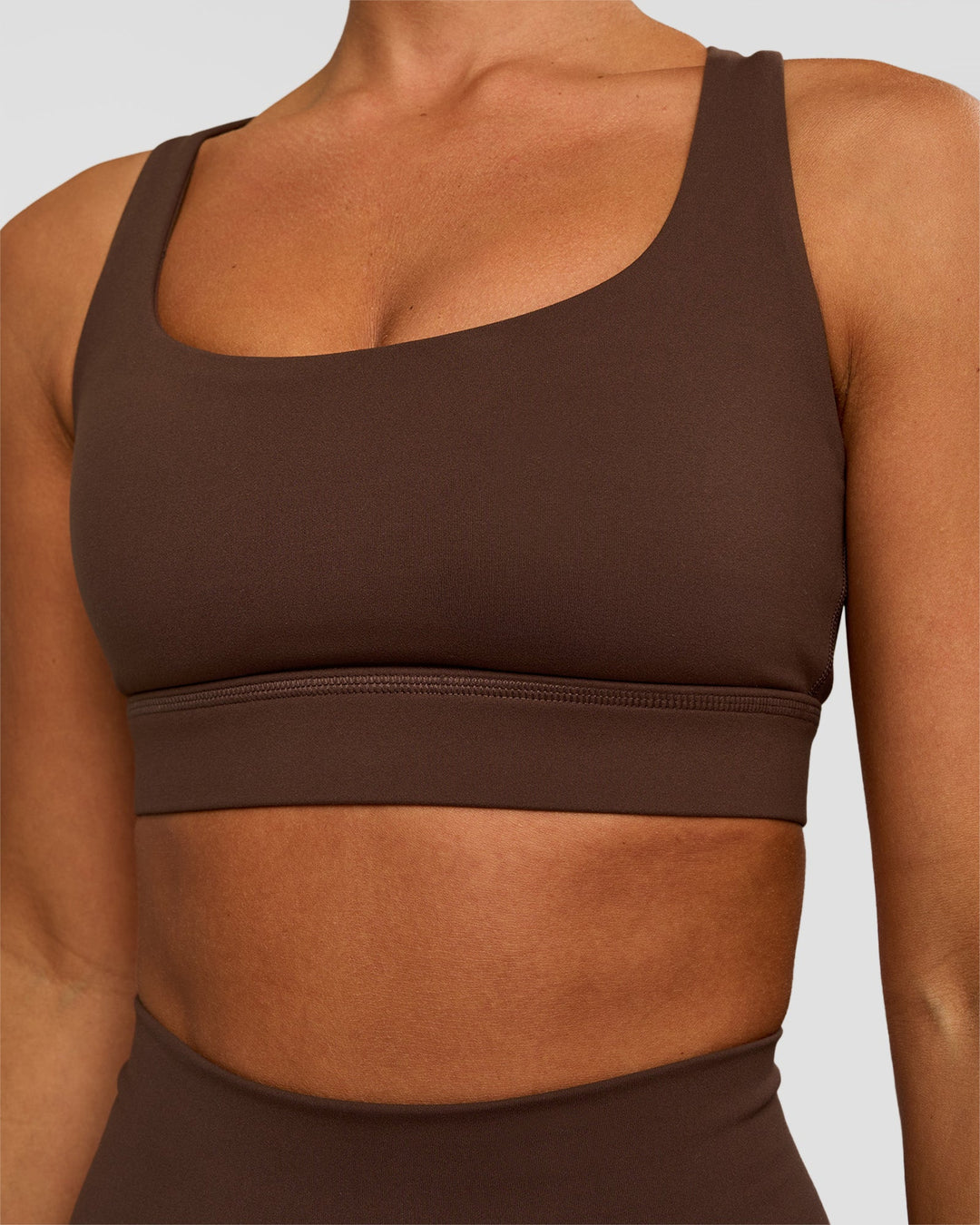 Woman wearing Race Day Sports Bra - Hot Chocolate | Model:Brylee | Size:XS