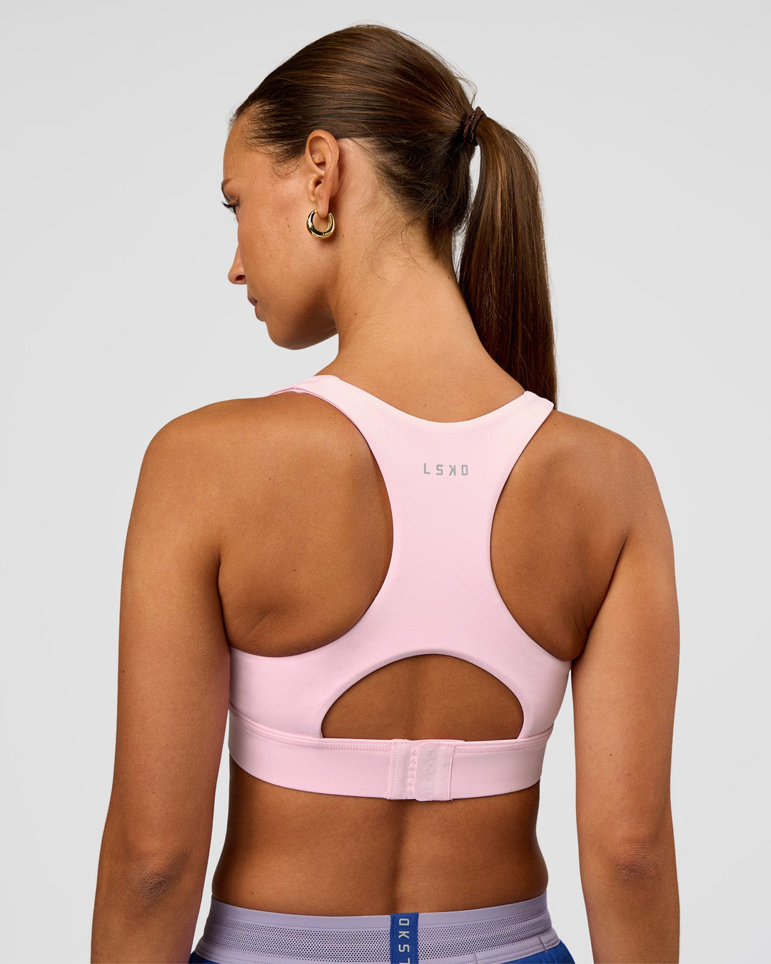Woman wearing Race Day Sports Bra - Marshmallow | Model:Brylee | Size:XS