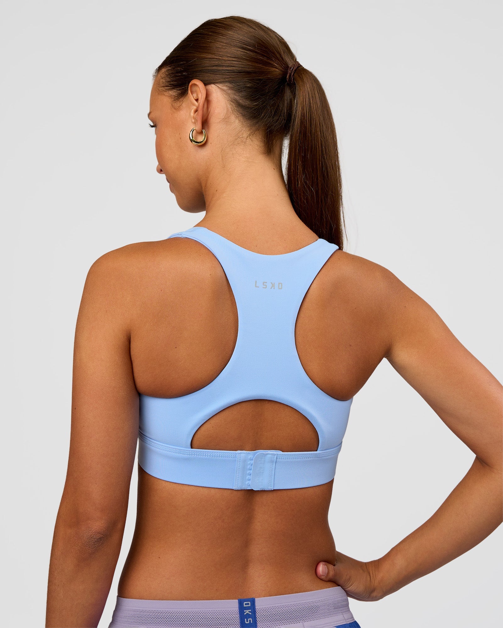 Woman wearing Race Day Sports Bra - Open Air | Model:Brylee | Size:XS