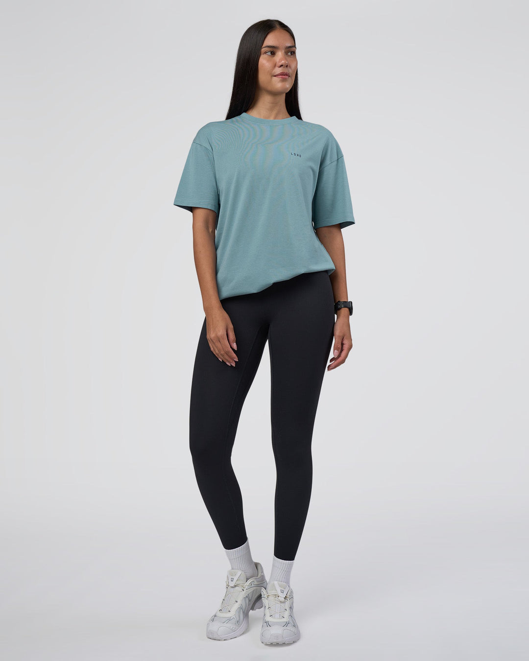 Woman wearing Research Department FLXCotton Oversized Tee - Smoke Blue | Model:Rhiley | Size:XS