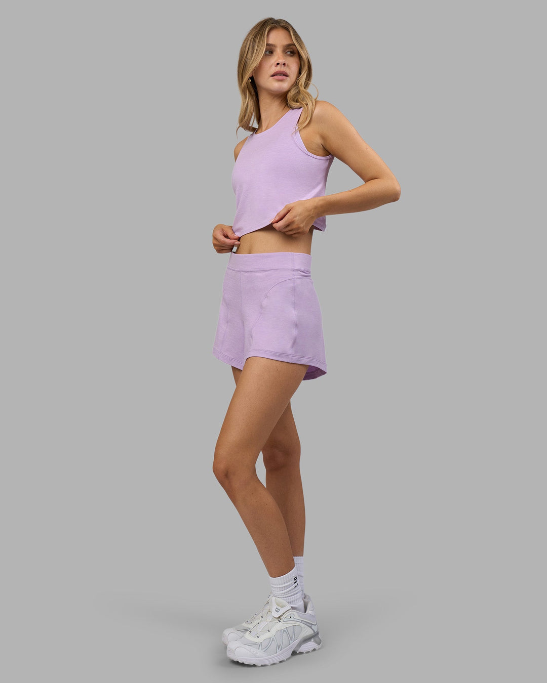 Woman wearing Restore CloudFLX Tank - Orchid Bloom Marl | Model:Leilani | Size:XS
