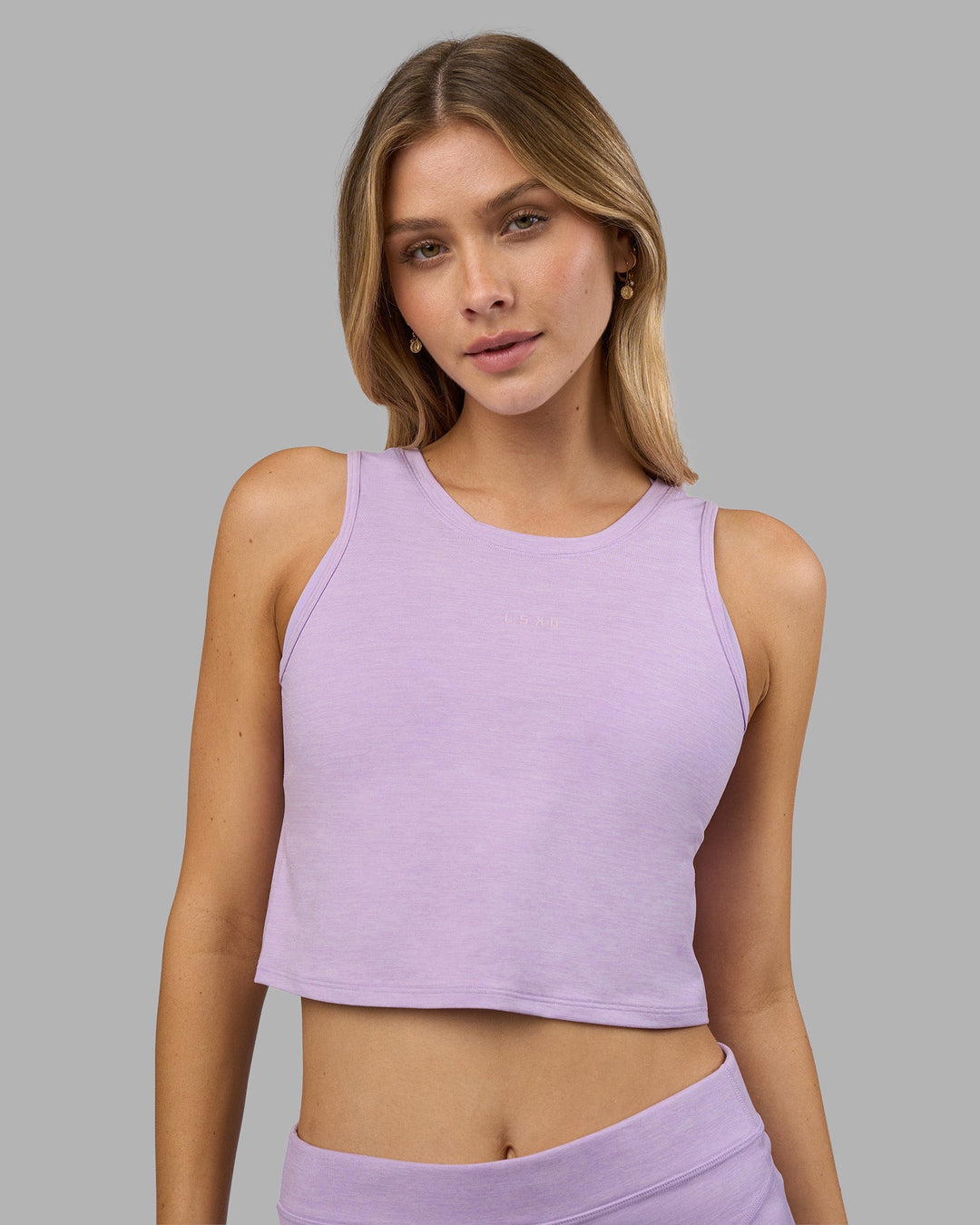 Woman wearing Restore CloudFLX Tank - Orchid Bloom Marl | Model:Leilani | Size:XS